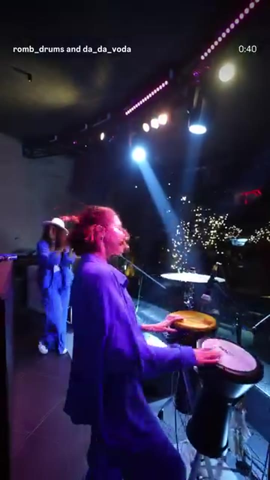 Rooftop night set, duo close-up